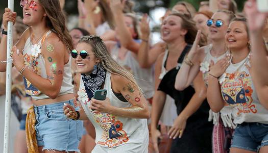 Students cheer during FSL bid day